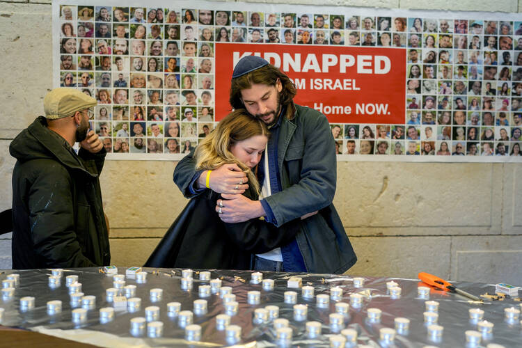Members of the Jewish community gather at a park in Sydney, Australia, on Oct. 7, as mourners marked the anniversary of the Oct. 7, 2023, Hamas attack. (AP Photo/Rick Rycroft)