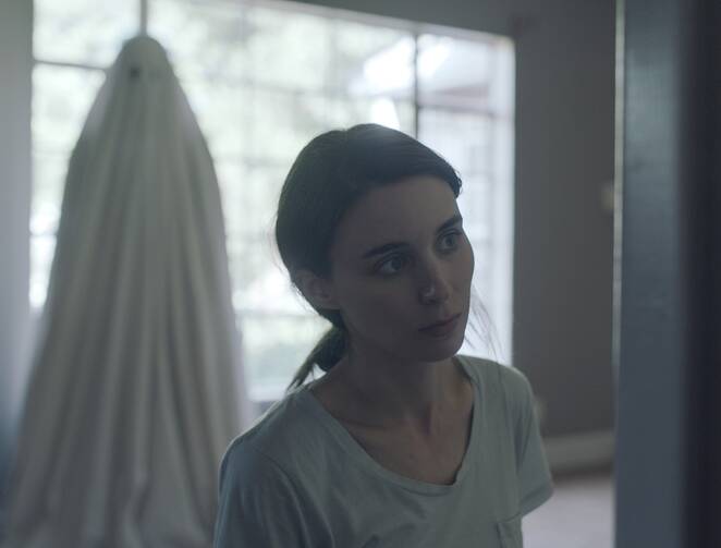 Rooney Mara stars in a scene from the movie “A Ghost Story” 