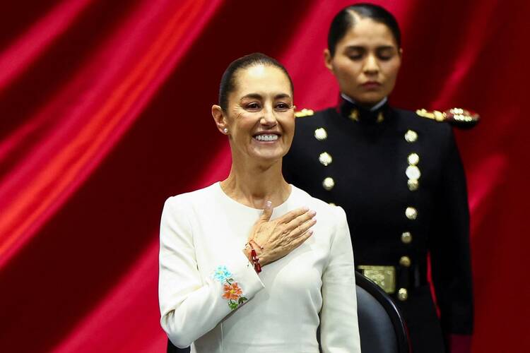 Mexico's President-elect Claudia Sheinbaum gestures at her swearing-in ceremony at the Congress in Mexico City Oct. 1, 2024. Sheinbaum, 62, an environmental scientist and former mayor of Mexico City, became Mexico's first female president in the nation's more than 200 years of independence. (OSV News photo/Raquel Cunha, Reuters)