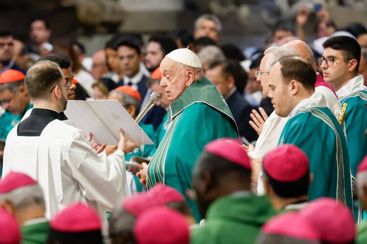 Pope Francis offers the opening prayer for the closing Mass of the Synod of Bishops on synodality in St. Peter's Basilica at the Vatican Oct. 27, 2024