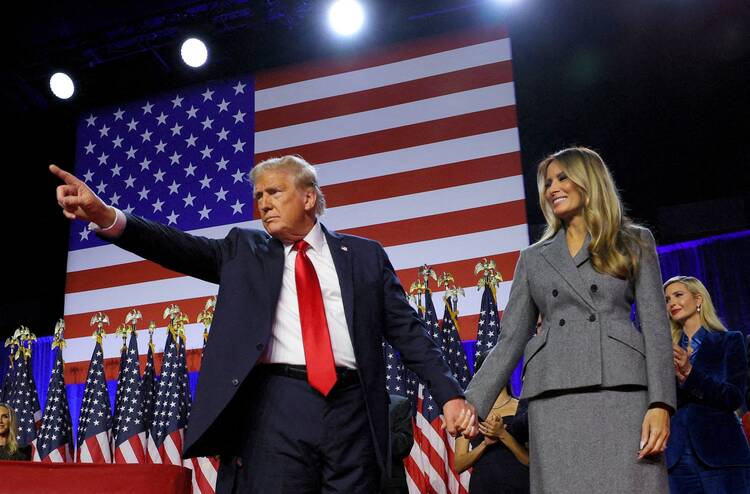 Republican President-elect Donald Trump gestures alongside his wife, Melania, during his rally at the Palm Beach County Convention Center in West Palm Beach, Fla., Nov. 6, 2024, after being elected the 47th president of the United States. (OSV News photo/Brian Snyder, Reuters)
