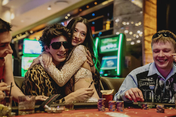 Mark Eydelshteyn, left, and Mikey Madison in "Anora" (Neon via AP)