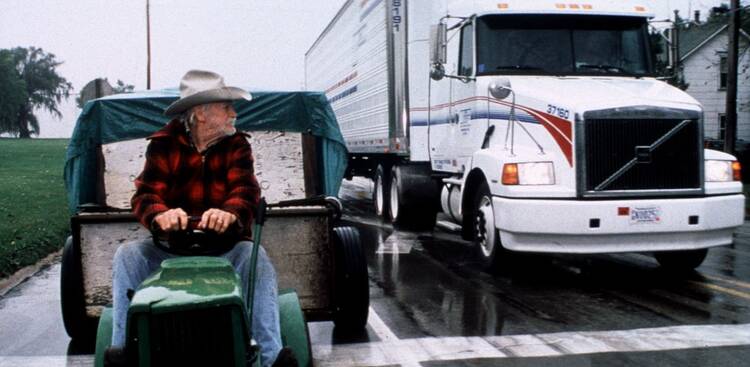 Richard Farnsworth plays 73-year-old farmer Alvin Straight in the film ''The Straight Story.'' (CNS photo from Disney) 