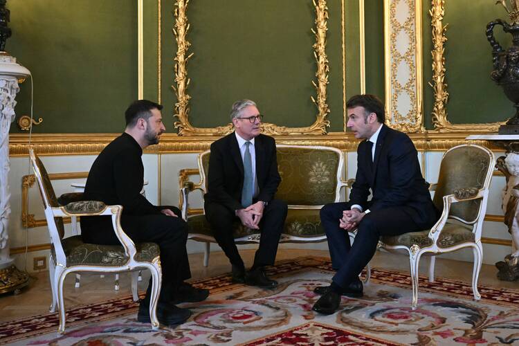 Ukrainan President Volodymyr Zelenskiy, British Prime Minister Keir Starmer and French President Emmanuel Macron hold a meeting during a European leaders' summit at Lancaster House in central London March 2, 2025. (OSV News photo/Justin Tallis, Reuters)