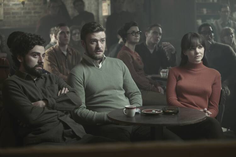 Oscar Isaac, Justin Timberlake and Carey Mulligan star in a scene from the movie "Inside Llewyn Davis" (CNS photo/CBS Films).