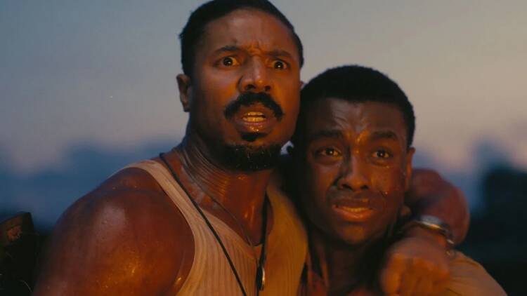 Michael B. Jordan, left, in “Sinners” (Warner Brothers)