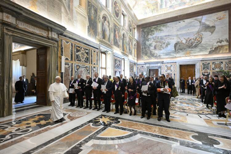 Pope Leo XIV arrives for an audience with the Vatican diplomatic corps in the Apostolic Palace's Clemetine Hall at the Vatican May 16, 2025. (CNS photo/Vatican Media)