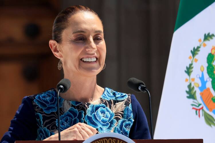 Mexican President Claudia Sheinbaum speaks during a rally at Zocalo Square in Mexico City on March 9. (OSV News photo/Toya Sarno Jordan, Reuters)