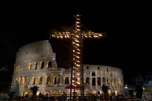 A view of the Colosseum prior to the arrival of Pope Francis to lead the Via Crucis (Way of the Cross) torchlight procession celebrated at the Colosseum on Good Friday in Rome, Friday, March 25, 2016 (AP Photo/Andrew Medichini).