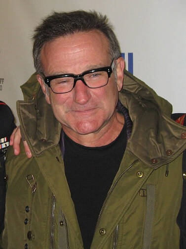 Robin Williams at "Stand Up for Heroes," a comedy and music benefit for injured U.S. servicemen. (Photo via Wikimedia Commons)