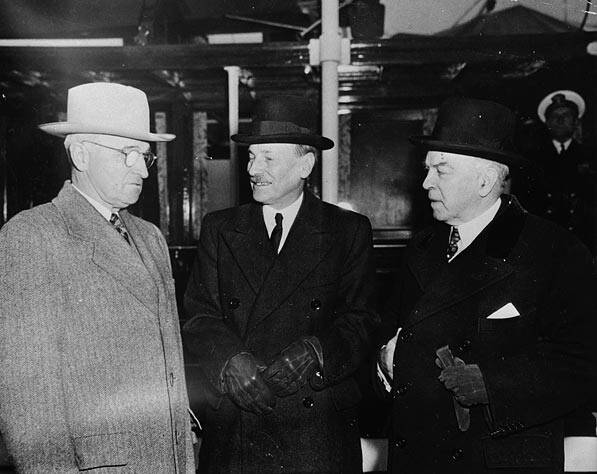 Harry Truman, Clement Attlee and Mackenzie King boarding the USCG Sequoia to discuss the atomic bomb, November 1945. (Harris & Ewing. Library and Archives Canada, C-023269)