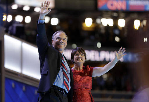 Democratic vice presidential candidate, Sen. Tim Kaine, D-Va., waves with his wife Anne Holton during the third day session of the Democratic National Convention in Philadelphia, Wednesday, July 27, 2016. (AP Photo/Matt Rourke)