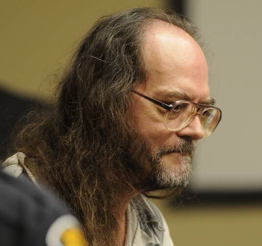 In this Aug. 16, 2010 file photo, Billy Ray Irick, on death row for raping and killing a 7-year-old girl in 1985, appears in a Knox County criminal courtroom in Knoxville, Tenn. (Michael Patrick/The Knoxville News Sentinel via AP, File)