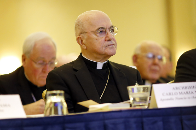 In this Nov. 16, 2015 file photo, Archbishop Carlo Maria Vigano, Apostolic Nuncio to the U.S., listens to remarks at the U.S. Conference of Catholic Bishops' annual fall meeting in Baltimore. (AP Photo/Patrick Semansky, File)