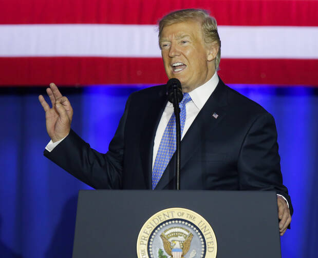 President Donald Trump speaks in Indianapolis on Sept. 27. Trump called the current tax system a "relic" and a "colossal barrier" that's standing in the way of the nation's economic comeback. (AP Photo/Michael Conroy)