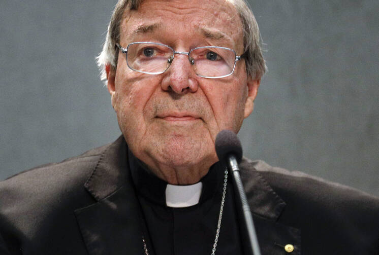 Cardinal George Pell meets the media, at the Vatican. (AP Photo/Gregorio Borgia, File)