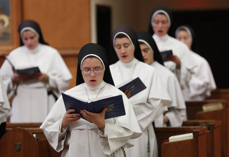 In this Nov. 14, 2017 photo, sisters sing at the Dominican Sisters of Mary, Mother of the Eucharist campus in Ann Arbor, Mich. Their third and latest album, “Jesu, Joy of Man’s Desiring: Christmas with the Dominican Sisters of Mary,” has muscled its way to the top of Billboard’s classical chart and climbed nearly as high on the holiday chart. (AP Photo/Paul Sancya)