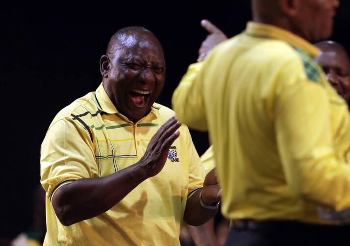 South African Deputy President, Cyril Ramaphosa, laughs at President Jacob Zuma, right, at the start of the ruling African National Congress elective conference in Johannesburg on Dec. 16. (AP Photo/Themba Hadebe, File)