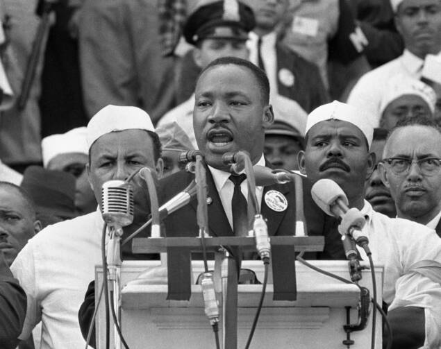 In this Aug. 28, 1963, file photo, Dr. Martin Luther King Jr., head of the Southern Christian Leadership Conference, addresses marchers during his "I Have a Dream" speech at the Lincoln Memorial in Washington. (AP Photo, File)