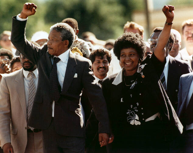Nelson Mandela and Winnie Mandela walk together on Feb. 11, 1990, upon his release from prison in Cape Town. Anti-apartheid activist Winnie Madikizela-Mandela died on April 2 at the age of 81. (AP Photo)