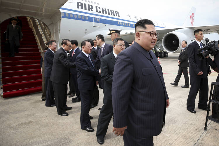 North Korean leader Kim Jong Un arrives at the Changi International Airport on June 10 in Singapore ahead of a summit with U.S. President Donald Trump. (Ministry of Communications and Information of Singapore via AP)