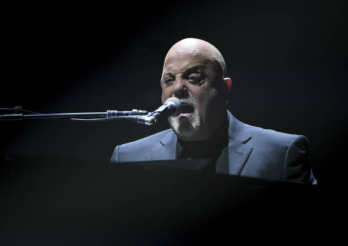 Musician Billy Joel performs during his 100th lifetime performance at Madison Square Garden on Wednesday, July 18, 2018, in New York. (Photo by Evan Agostini/Invision/AP)