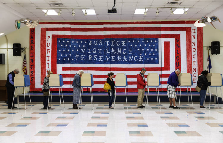 Voters cast their ballots at Robious Elementary School in Chesterfield, Va., on Tuesday, November 6, 2018. (Daniel Sangjib Min/Richmond Times-Dispatch via AP)