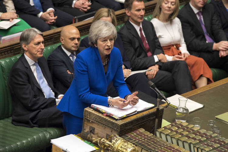 Britain's Prime Minister Theresa May speaking during Prime Minister's Questions at the House of Commons in London, on Dec. 19. Britain is due to leave the EU on March 29, but it remains unclear whether lawmakers will approve the divorce agreement negotiated with the bloc.(Mark Duffy/UK Parliament via AP)