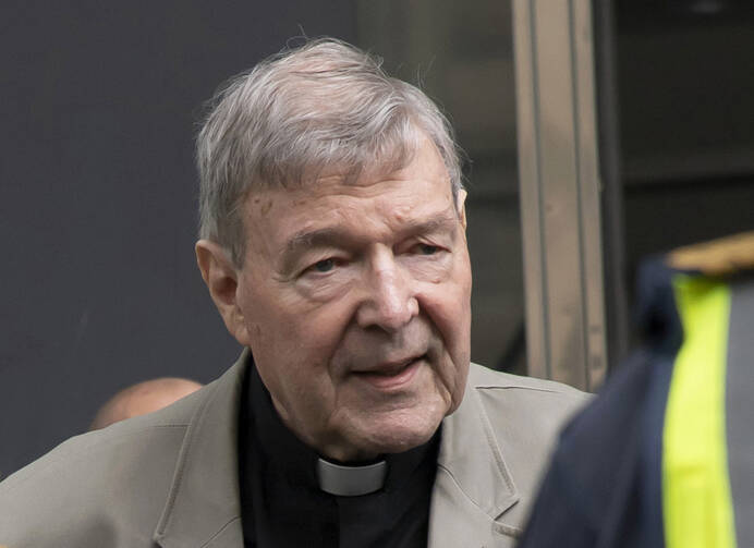 In this Feb. 26, 2019, file photo, Cardinal George Pell arrives at the County Court in Melbourne, Australia. An Australian court spokesman says Pell will not fight for a reduced jail sentence if he fails in his appeal of his conviction for molesting two choirboys in the 1990s. (AP Photo/Andy Brownbill, File)