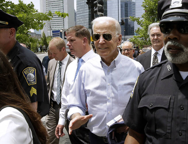 Former vice president and Democratic presidential candidate Joe Biden walks with Boston Mayor Marty Walsh, left, on Wednesday, June 5, 2019, in downtown Boston. (AP Photo/Steven Senne)