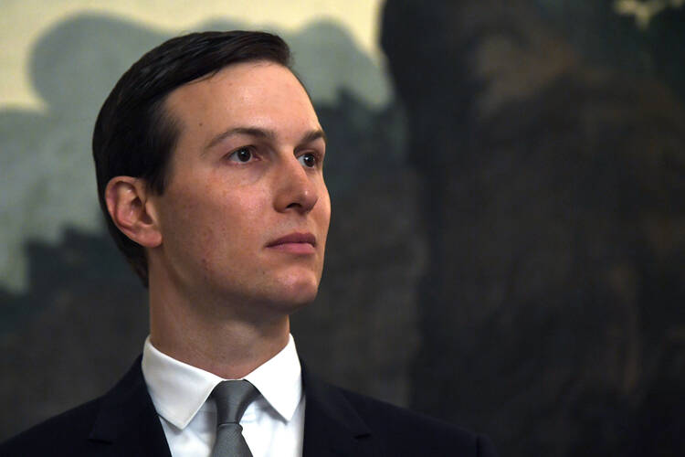 White House adviser Jared Kushner listens during a proclamation signing with President Donald Trump and Israeli Prime Minister Benjamin Netanyahu in the Diplomatic Reception Room at the White House in Washington.