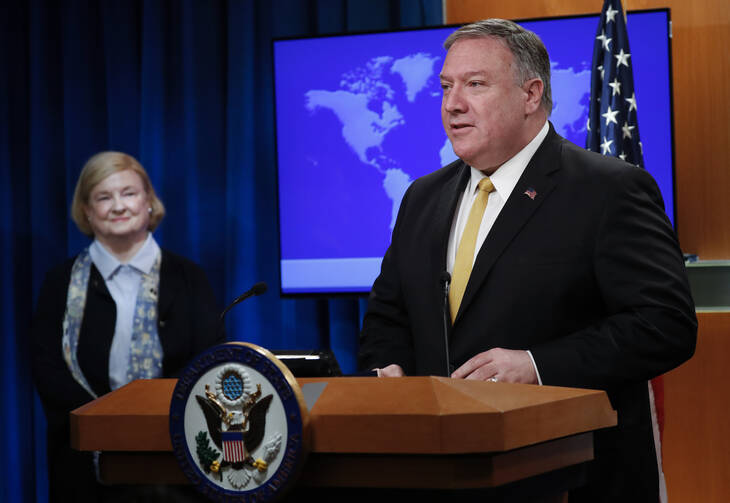 Secretary of State Mike Pompeo, right, unveils the creation of Commission on Unalienable Rights, headed by Mary Ann Glendon, left, a Harvard Law School professor and a former U.S. Ambassador to the Holy See, during an announcement at the US State Department in Washington, Monday, July 8, 2019. (AP Photo/Pablo Martinez Monsivais)