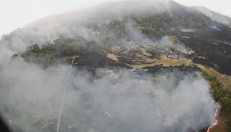 In this Aug. 20, 2019 drone photo released by the Corpo de Bombeiros de Mato Grosso, brush fires burn in Guaranta do Norte municipality, Mato Grosso state, Brazil. (Corpo de Bombeiros de Mato Grosso via AP)