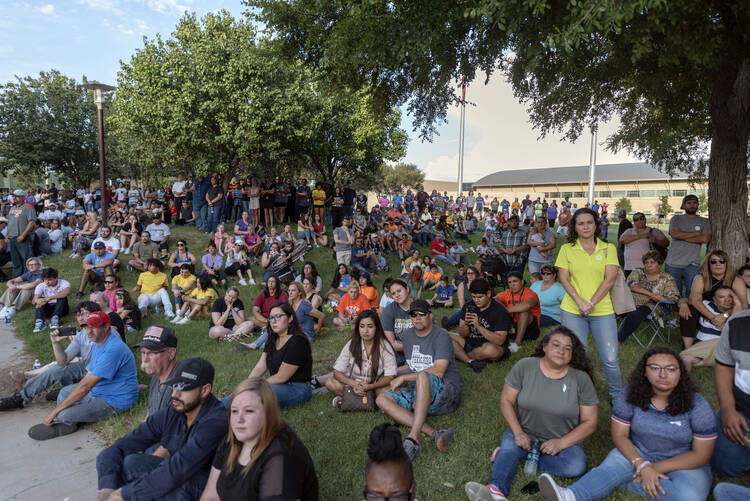 A vigil on Sept. 1, at the University of Texas of the Permian Basin, for victims of a shooting spree the day before in Odessa, Texas. (Jacy Lewis/Reporter-Telegram via AP)