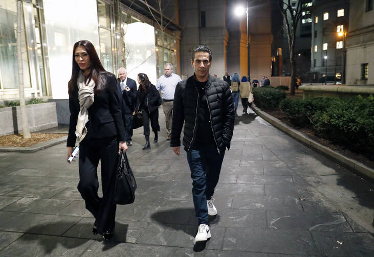Joseph "Skinny Joey" Merlino, right, leaves federal court in Lower Manhattan with his wife Deborah after a mistrial was declared in his racketeering case on Feb. 20, 2018 in New York. The author appears in the center background of the photo (AP Photo/Kathy Willens).