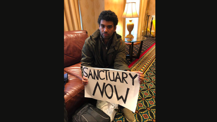 Sanctuary-city activist Felix Cepeda of New York City is seen during the first day of the U.S. bishops' fall general assembly in Baltimore on Nov. 13. He planned to pray and fast for the next three days in hopes the Catholic Church would offer its church properties as places of sanctuary to keep families intact if a family member faces deportation. (CNS photo/Rhina Guidos)