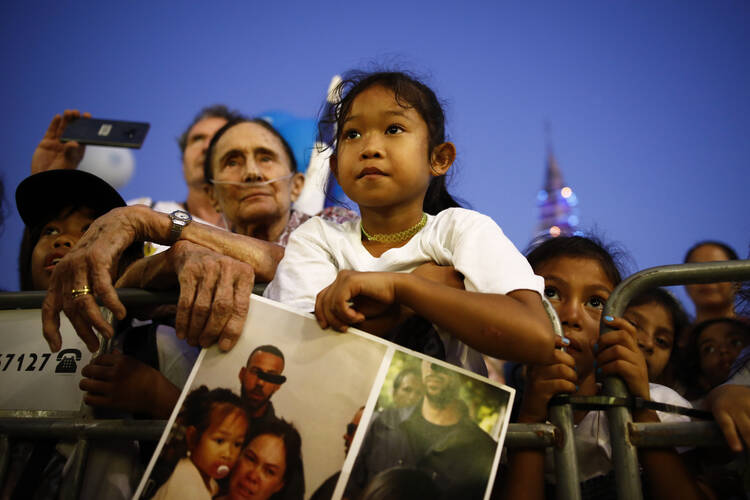 Two people attend a rally in Tel Aviv