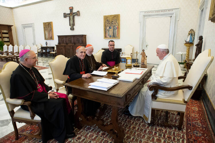  Pope Francis meets with officials representing the U.S. Conference of Catholic Bishops at the Vatican Sept. 13. Pictured from left are Archbishop Jose H. Gomez of Los Angeles, vice president of the conference, Cardinal Daniel N. DiNardo of Galveston-Houston, president of conference, Cardinal Sean P. O'Malley of Boston, president of the Pontifical Commission for the Protection of Minors, and Msgr. J. Brian Bransfield, general secretary of the conference. (CNS photo/Vatican Media) 