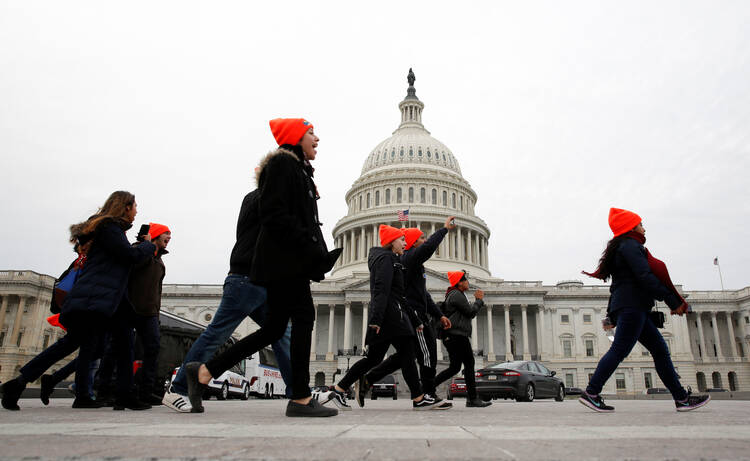 Young protesters call for an immigration bill to address the Deferred Action for Childhood Arrivals program at a rally in 2017 on Capitol Hill in Washington. (CNS photo/Joshua Roberts, Reuters)