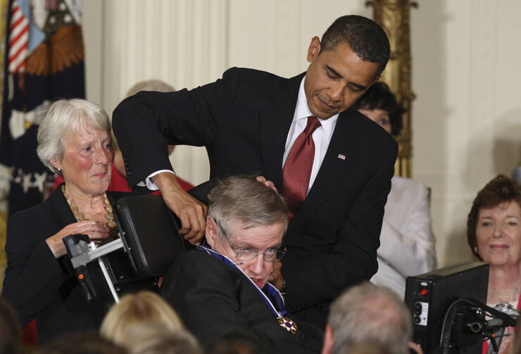 U.S. President Barack Obama presents the Medal of Freedom to Stephen Hawking during a ceremony at the White House in Washington Aug. 12, 2009 (CNS photo/Paul Haring).
