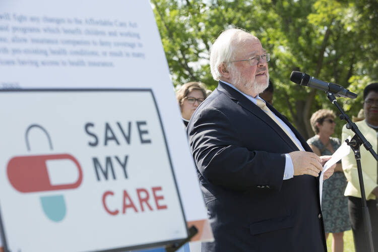 John Carr, director of the Initiative on Catholic Social Thought and Public Life at Georgetown University, speaks during a 23-hour prayer vigil June 29 on Capitol Hill in Washington. The vigil focused on preserving Medicaid and was organized after the Senate delayed a vote on the Better Care Reconciliation Act, its health care reform bill. (CNS photo/Jaclyn Lippelmann)