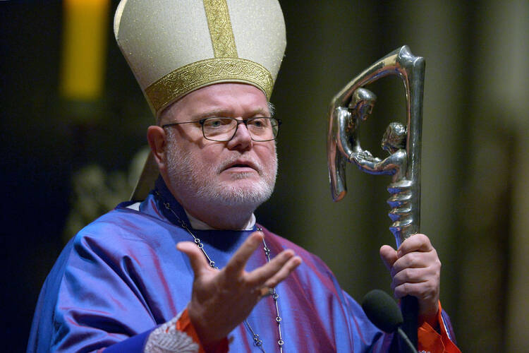 Cardinal Reinhard Marx of Munich-Freising, president of the German bishops' conference, celebrates Mass in 2017 during the opening of the annual meeting of Germany's bishops at the cathedral in Cologne. (CNS photo/Sascha Steinbach, EPA) 