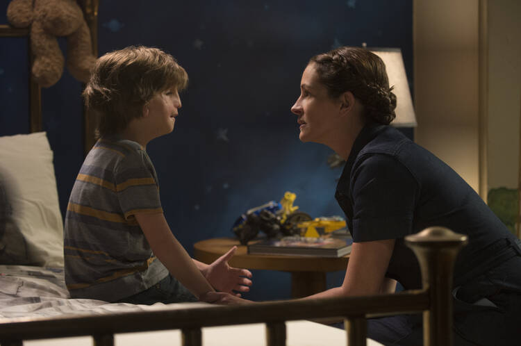 Jacob Tremblay and Julia Roberts in “Wonder” (CNS photo/Lionsgate). 