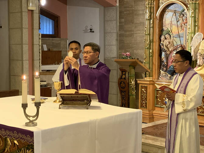 Cardinal Luis Antonio Tagle, prefect of the Congregation for the Evangelization of Peoples and president of Caritas Internationalis, celebrates Mass at the Pontifical Filipino College in Rome Feb. 27, 2020, the anniversary of his priestly ordination. (CNS photo/courtesy of Father Alfonso Alojipan)