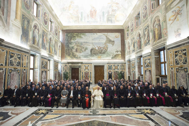 Pope Francis meets with national directors of the pontifical missionary societies, which include the Society for the Propagation of the Faith, the Missionary Childhood Association, the Society of St. Peter Apostle and the Missionary Union of Priests and Religious at the Vatican June 1. (CNS photo/Vatican Media)