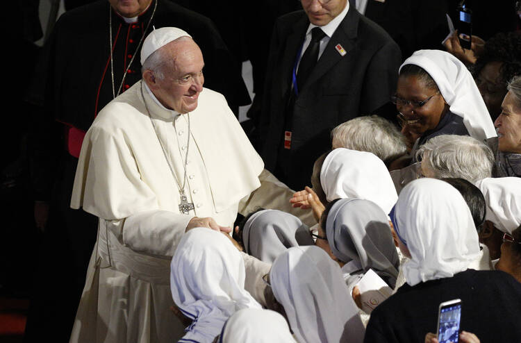 Pope Francis greets nuns as he meets with priests, religious men and women and the ecumenical Council of Churches at the cathedral in Rabat, Morocco, March 31, 2019. (CNS photo/Paul Haring)