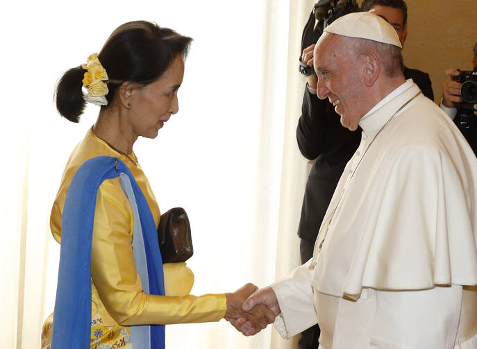 Pope Francis greets Aung San Suu Kyi, leader of Myanmar, during a private audience at the Vatican May 4 (CNS photo/Paul Haring).