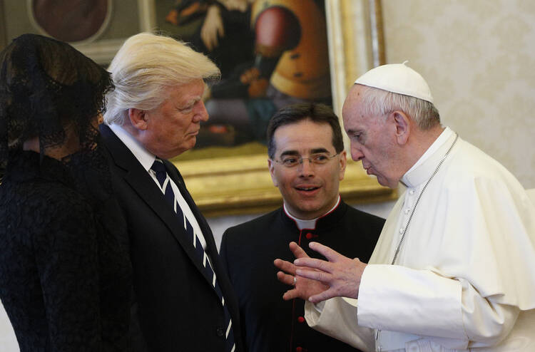 Pope Francis talks with U.S. President Donald Trump during a private audience at the Vatican May 24 (CNS photo/Paul Haring).