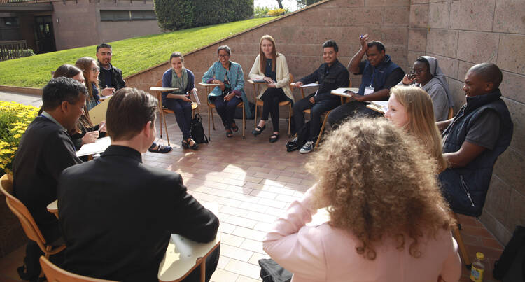 Young people talk during a conference in Rome April 6. The conference was in preparation for next year's Synod of Bishops on young people, the faith and vocational discernment and World Youth Day in 2019. (CNS photo/courtesy Dicastery for Laity, Family and Life)