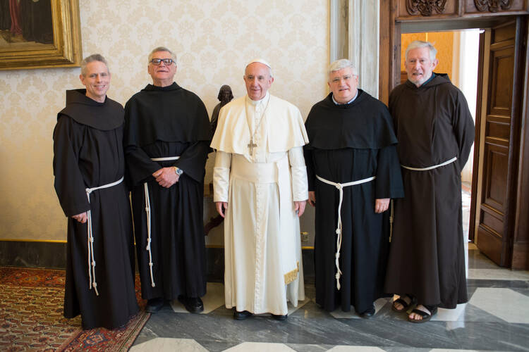 in April 2017. The Rev. Marco Tasca, who was just appointed archbishop of Genoa on May 8, is second from the right. (CNS photo/L'Osservatore Romano) 